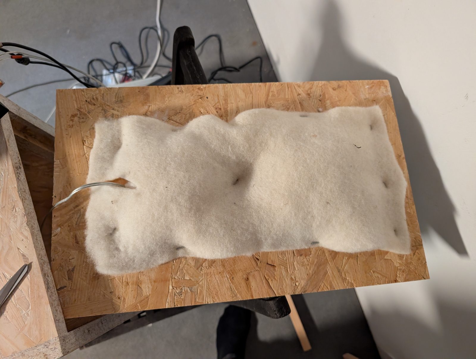 L-06: fill pressed flat under wool