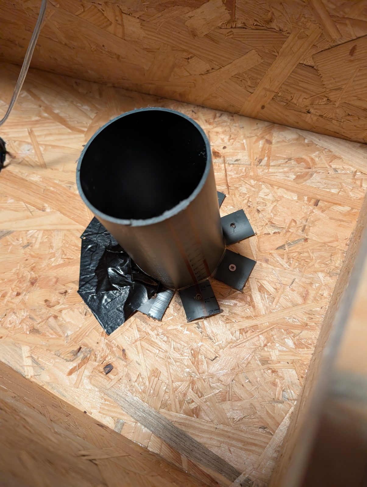 The tube mounted from the inside with screwed flaps